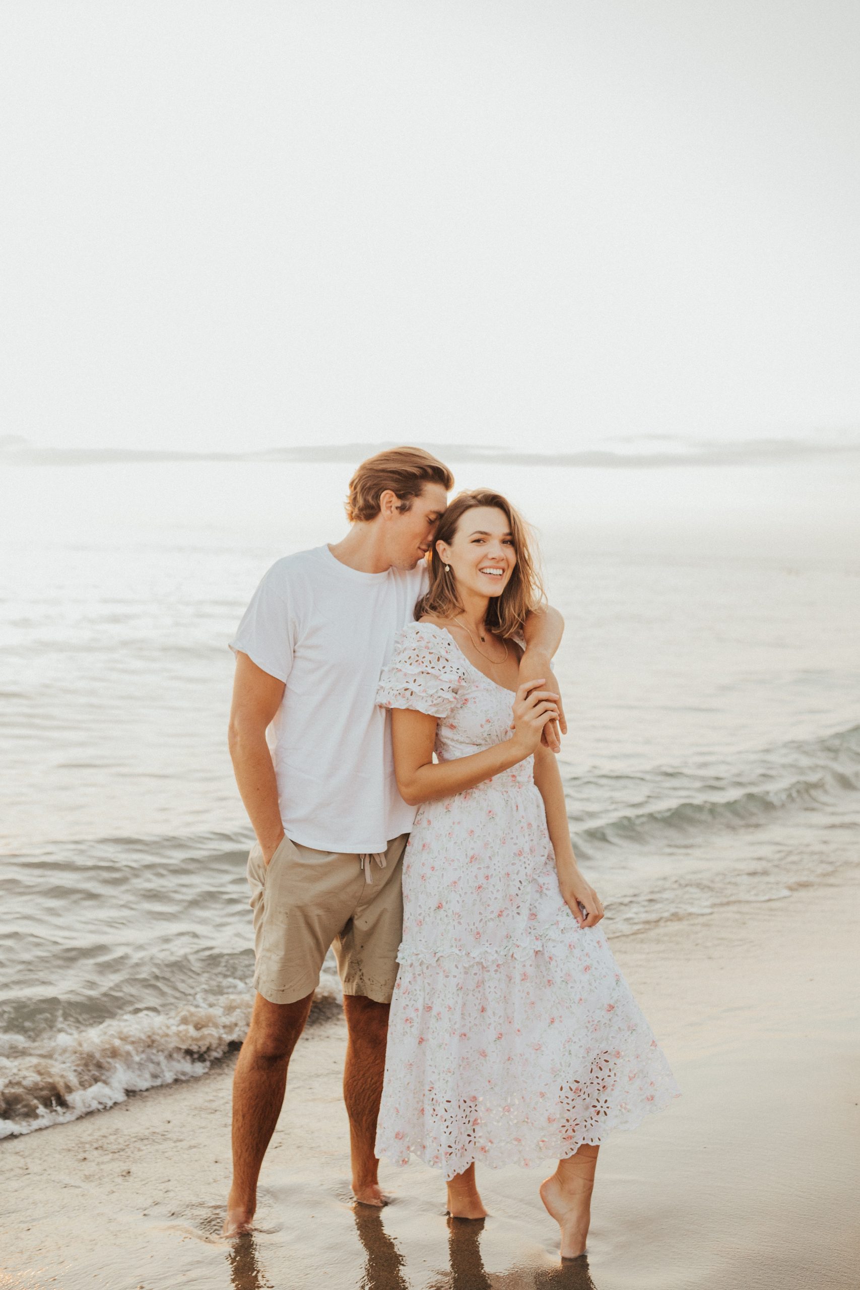 Couple on beach, beach engagement photos, engaged couple on beach